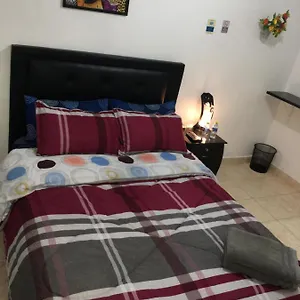 Habitación en casa particular Dorado Airport Rooms&apartments